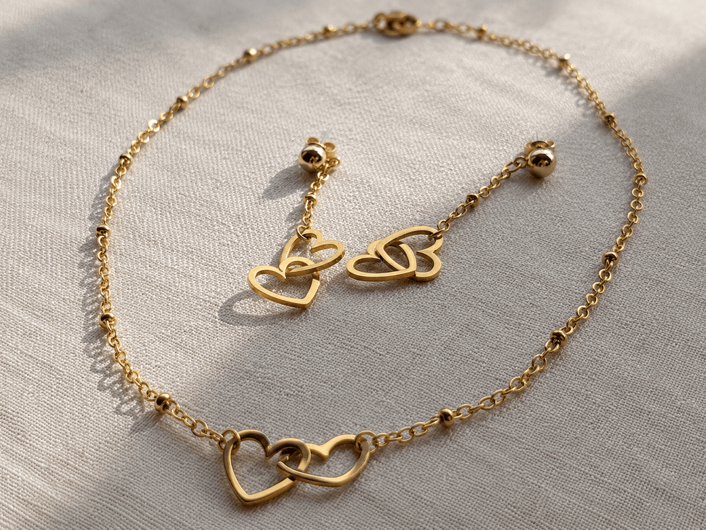 bijoux dorées collier cœurs entrelacés et boucle d'oreille pendantes assorties en acier inoxydable 