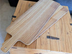 2 modèles de planches apéro XXL idéal pour présentation charcuteries fromages tapas etc. 1 mètre de long par 30 cm de large. bois naturel. finition vernis alimentaire pour une gravure qui dure. 